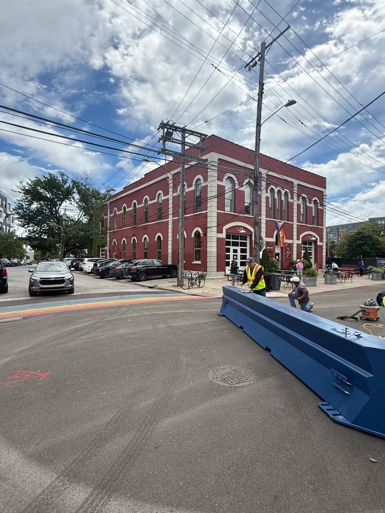 Haven crew setting a barrier at a street intersection
